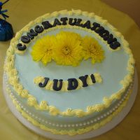 Blue And Yellow chocolate with fresh strawberries, bananas and bananca cream filling.fresh yellow flowers. Blue and yellow whip cream.