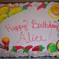 Fiesta chcoclate cake, chcolate whipped cream, with both gumpast and fondant decorations. strawberry "salsa",MMF chips, edible tacos