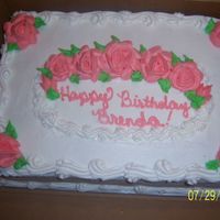 100_1909.jpg a buttercream frosted cake for a woman at my dad work