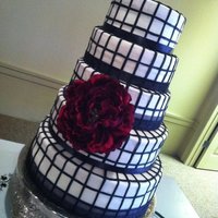 Blackandwhite Black and white cake in buttervream with fondant accents. Cake was red velvet