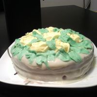 Lemon Ganache This was a lemon cake with raspberry filling, white chocolate ganache frosting and butter cream roses. Nothing special to look at but...