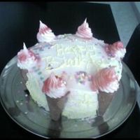 Ice Cream Birthday Cake This was my first cake I made for a friends birthday. I got the basic idea from a cake I saw on CC. It was a strawberry/white marble cake...