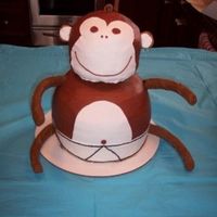 Monkey Cake I did this for a first birthday party. The arms and legs are plastic tubing covered in fondant. The tail is a wooden stick with fondant and...