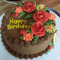 Fall Birthday Cake This is the first cake I've put on this site. This cake was for a coworker last fall. It's my first try using CBC. The flowers...