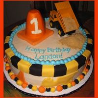 Construction Cone Cake I was given a picture of this cake from a birthday supply catalog. I added the traffic cone on top to use as a smash cake and the truck and...