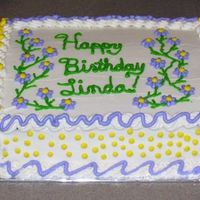 Birthday Cake White Cake with BC frosting. I made this and it was my first paid cake. I think it turned out well.