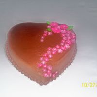 102_1169.jpg Edmonds wedding grooms cake. Chocolate buttercream with gumpaste flowers and leaves.