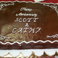 Stohl 30Th Anniv French Vanilla Cake with Chocolate Cream Filling and Chocolate Syrup Frosting. The frosting works up more like ganache than BC.