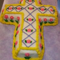 Easter Cross Taken verbatem from 1985 Wilton YB, Fr Vanilla, all BC Dream w/ Royal Flowers. DH picked this one for his mom. Easy to do. Remind me not to...