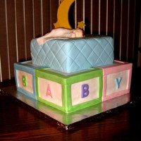 Sleeping Baby Shower Cake This is a cake I made for a Baby Boy's Baby Shower. The cake is Marble. 8" and 12" Square. Covered in MMF. The baby is...