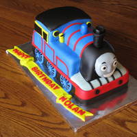 Thomas The Train I made this for a friend's son's birthday. Marble cake covered in BC then MMF.