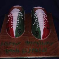 Bowling Shoes? Or Cake? If I had to guess, I'd say they are about a size 13! Both shoes cut out of a 9x13 cake and then slightly carved. One of the girls is...