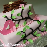 Birds And Leaves Baby Shower Cake This is a baby shower cake I made recently. It's design is based on the baby shower invitation. Cakes are covered in fondant. The...