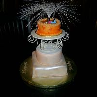 Homes_021.jpg This was a cake I made for my boyfriend's niece's 24th birthday. The only request was that it be orange. The bottom two layers...