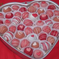 Valentine's Day Cake Balls A variety of cake balls to try out some different flavors. The white is chocolate amaretto, the red is raspberry almond, the light pink is...
