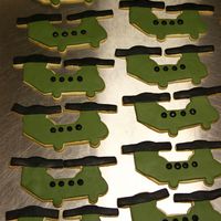 Chinook Ch47 Helicopter Cookies My husband is in flight school so I made these for the family day. This is the first time ever making fondant covered cookies and it took...