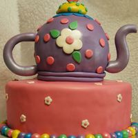 Tea Party Mom wanted a colorful teapot cake to go with the partyware.