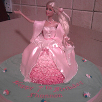 Barbie made this for a friends daughters 7th birthday that is barbie mad, she said when she saw it why cant they make barbie a dress like that in...