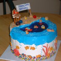 Gone Fishin' This cake was for a two year old's birthday and believe me I didn't want to cut that cake (I attended the party). It took lots of...