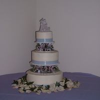Wedding - June 2006 All marble cake with Buttercream frosting. This cake had a periwinkle satin ribbon around each layer as well as Alstromeria between each...