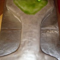 Martini Cake Cut from a sheet cake and covered in fondanted, brushed with Luster dust and added tinted piping gel.