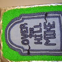 Over The Hill Cake Cake is decorated with 100% buttercream...