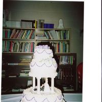 Another One Bites The Dust Another Wedding Sunday at our Parish. This cake featured different batters and fillings and had shaved Ghiradelli White Chocolate on top of...