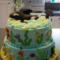 Under The Sea This was for my daughter's 5th birthday. Buttercream frosting with fondant accents. Whale is rice crisipies covered with fondant.