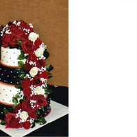 Black, White, And Red Wedding My best friend's wedding cake. BC frosting with real flowers, baby's breath and leaves.