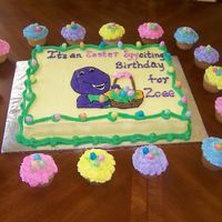 Easter Egg-Citing Barney Birthday FBCT on cake, ljelly bean trim and jellybeans on matching cupcakes.