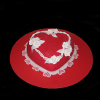 Roses Are Red.....or White Puffed heart covered in red fondant using an impression mat (difficult to see in photo), decorated with handmade gumpaste roses and leaves...