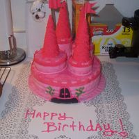 Pink Castle Cake I did this one for a friend of mine's daughter. This was my first attempt to do a castle cake. I had fun doing it.