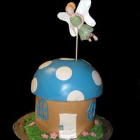 Woodland Fairy Gumpaste Fairy, MMF covered mushroom, BC grass, fondant flowers and accents. I have seen many of these fairy cakes here on CC, don't...