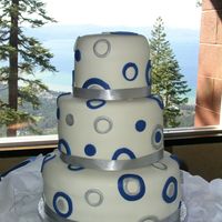 Cake Witha View! 12" 9" 6" covered with MFF with MFF decorations. This cake had to endure a 2 1/2 hr car ride, a ride up the arial tram (to...