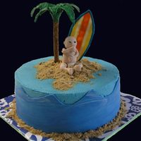 Surfer Baby Surfer baby molded from gumpaste, chocolate surfboard, chocolate and pretzel palm tree, fondant ocean waves...this is the mmf batch I had...