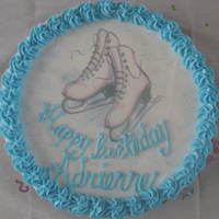 Ice Skating Cake This is a cookie cake made for my daughter's 13th birthday. It is decorated with an edible image.