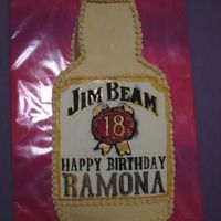 Jim Beam Cake two layers of coca-cola cake filled with jim beam bourbon whiskey vanilla mousse, iced in cola-flavored buttercream. label and cap are made...