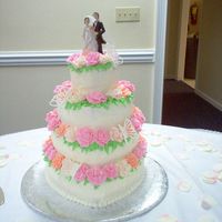 Heart Shaped This was my first wedding cake ever, made for a friend on a very tight budget. It was 4 teir, butter cake with buttercream icing and roses...