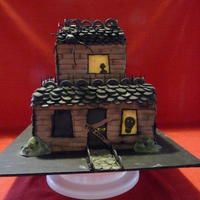 Haunted House This birthday cake is for a girl who does not like girl stuff. She's hosting a murder mystery birthday party, and she wanted a haunted...