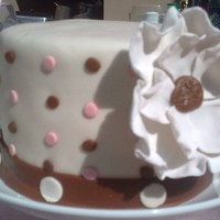 Salma's Cake MMF covered cake, Gumpaste flower.