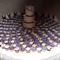 Calla Lily Wedding Chocolate 3 tiered cake w/ribbon and gumpaste calla lilies. Top tier is slanted. Chocolate and Cinnamon Toast Cupcakes w/chocolate "S&...