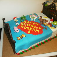 Toy Story 2 3 Quarter sheet Chocolate cake strawberry filling chocolate ganache. My son is crazy about Toy Story, we spent hours looking at cakes here...