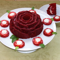 Red Velvet Strawberry Creamcheese Bundt Cake Red velvet bundt cake with a cream cheese strawberry filling. strawberry rose accents, topped with a strawberry glaze.