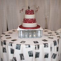 My Wedding Cake - Long View My wedding cake taken from farther away. The tablecloth has iron-on transfers of old wedding photos of mine & my husband's parents...