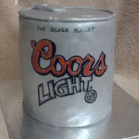 Can Of Coors Chocolate cake with chocolate BC filling and frosted with choc. BC. Covered in fondant and painted with lustre dust. Label is hand painted...