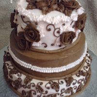 Pink & Brown Chocolate raspberry cake with chocolate filling, covered in vanilla & chocolate BC.