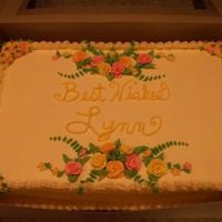 Retirement Cake This was a cake for a retirement that I did for someone in my office - flowers are royal icing and the rest is made from buttercream icing...
