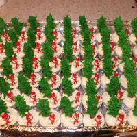 Snowman Cupcakes These are cupcakes that I did for my son's Christmas party at pre-school. They are all buttercream and the trunks of the trees are...