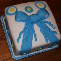 First Fondant Present Cake - Course Iii This is the first fondant covered cake I made, for Course III. It was white almond sour cream cake, with raspberry mousse filling.