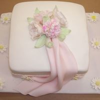 Course "iv" - Fondant And Gumpaste Final This is the final cake I did for the new Wilton Fondant and Gumpaste course. I really enjoyed making the gumpaste flowers.